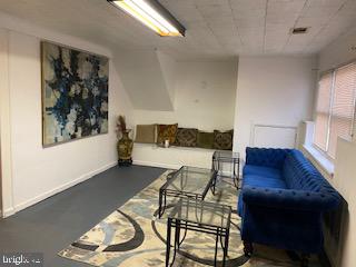 3407 Orbitan Road Parkville, MD 21234 - Photo 23 of 23 a living room with furniture and a window