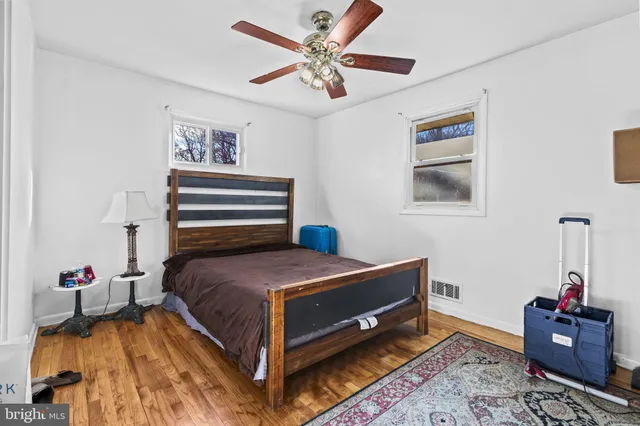 a view of a house with a yard and a garage