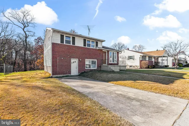 a living room with a furniture and a window