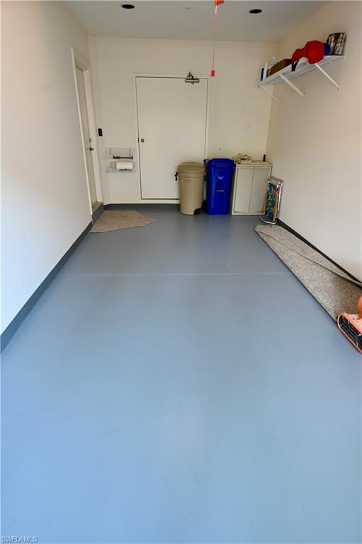 157 Colonade Circle, Unit 1002 Naples, FL 34103 - Photo 20 of 23 View of garage