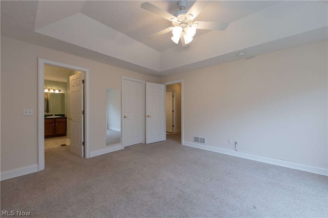 4902 Foote Road, Unit 14 Medina, OH 44256 - Photo 18 of 42 Primary Bedroom with attached walk in closet and bathroom.