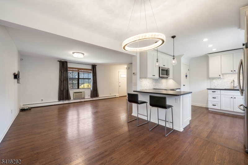 768 Springfield Avenue, Unit E4 Summit, NJ 07901 - Photo 1 of 28 a kitchen with stainless steel appliances granite countertop a stove a sink and a refrigerator