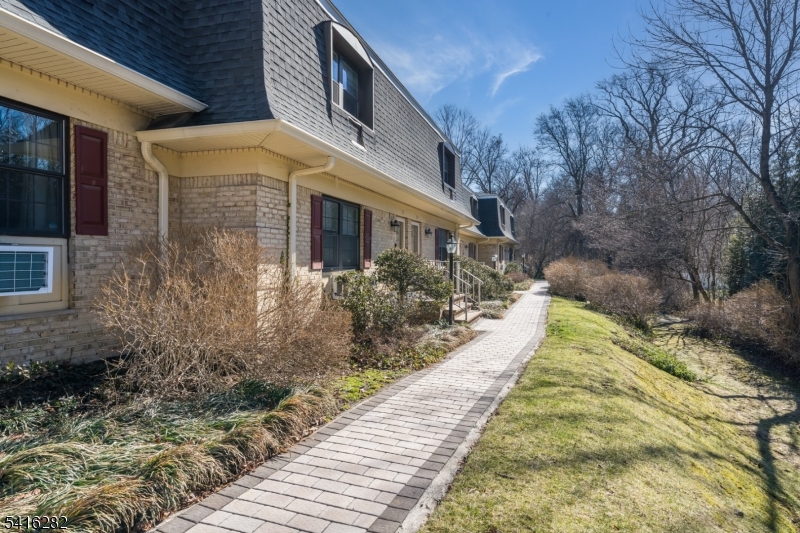 768 Springfield Avenue, Unit E4 Summit, NJ 07901 - Photo 26 of 28 a view of a pathway with a house