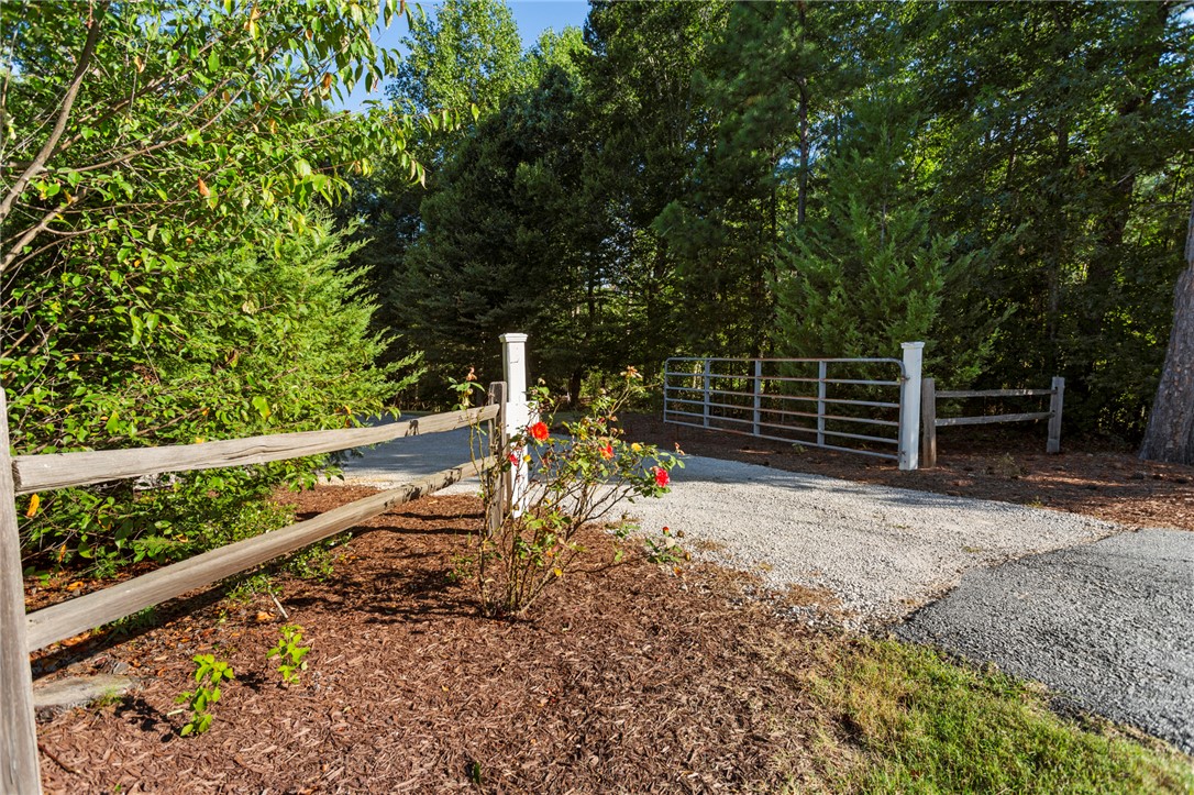 645 State Rd S-37-54 Seneca, SC 29678 - Photo 4 of 36 Gated Driveway