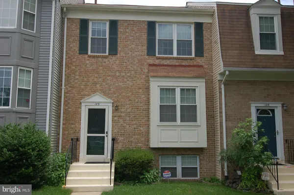 a house that has a window in front of it