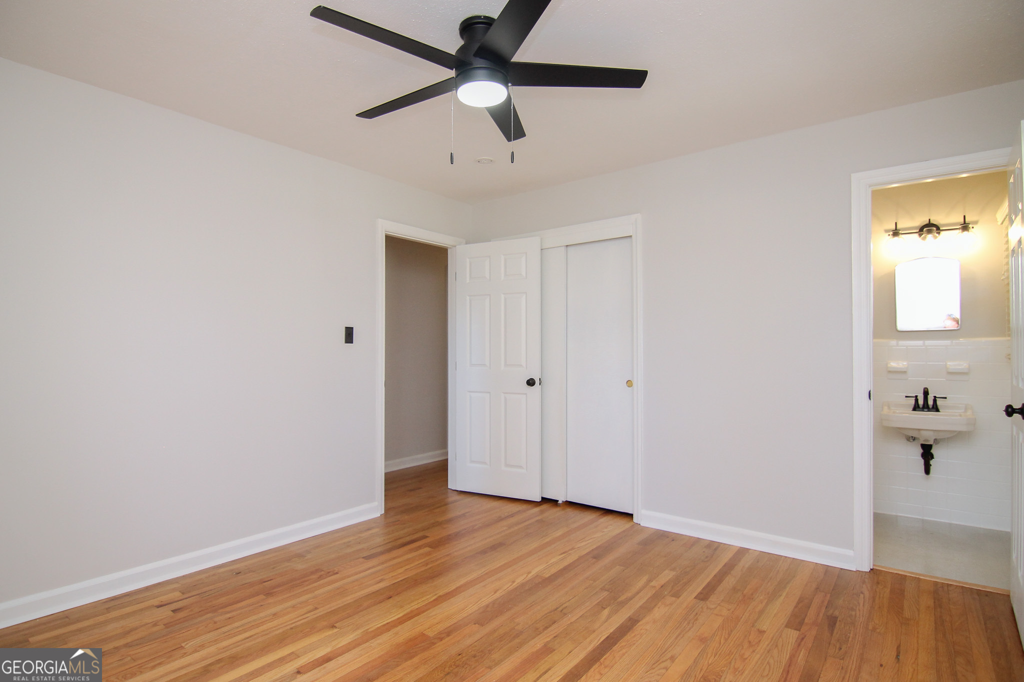 110 Springdale Drive Warner Robins, GA 31088 - Photo 16 of 25 wooden floor in an empty room