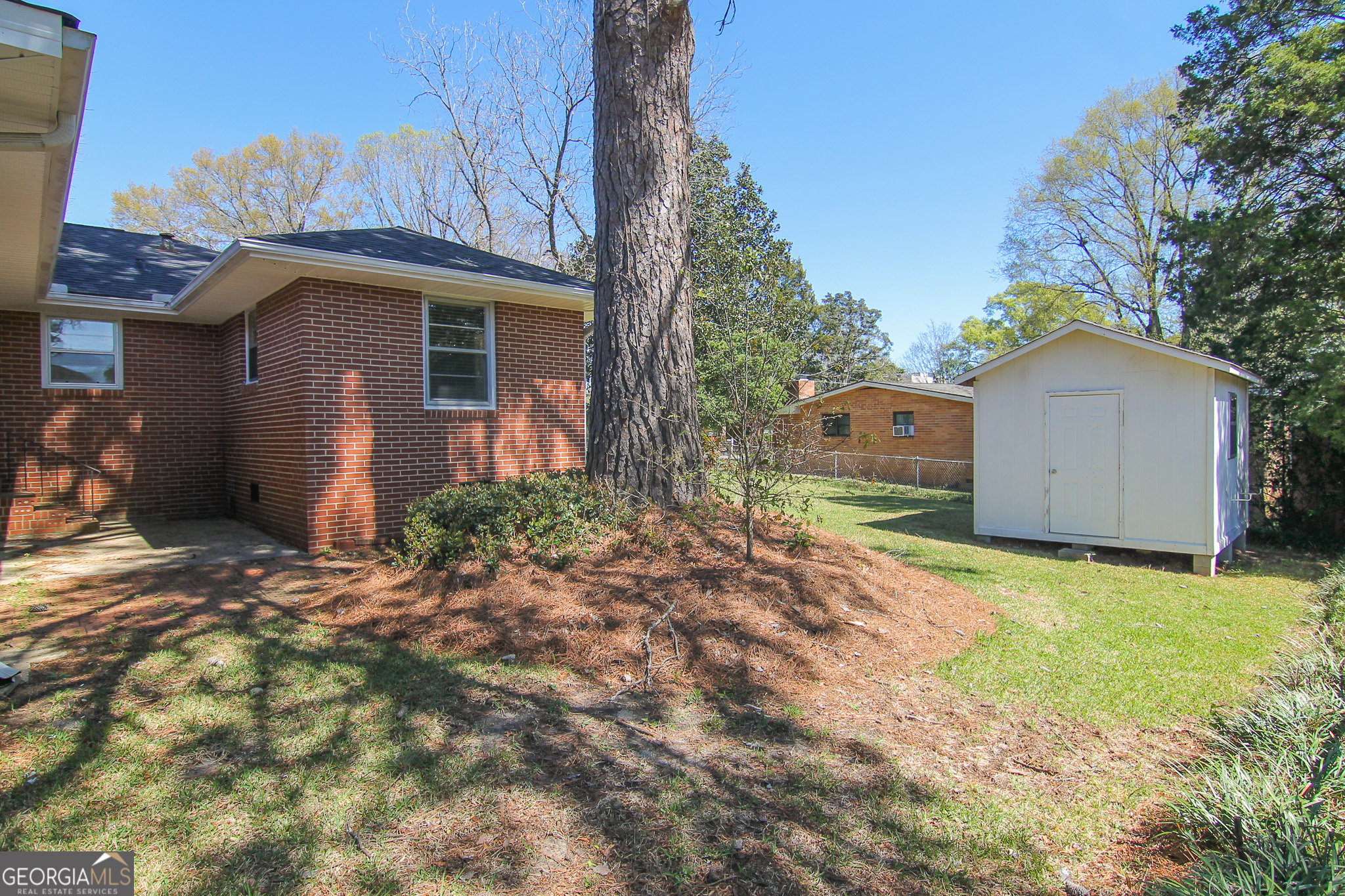 110 Springdale Drive Warner Robins, GA 31088 - Photo 22 of 25 a house view with a backyard space