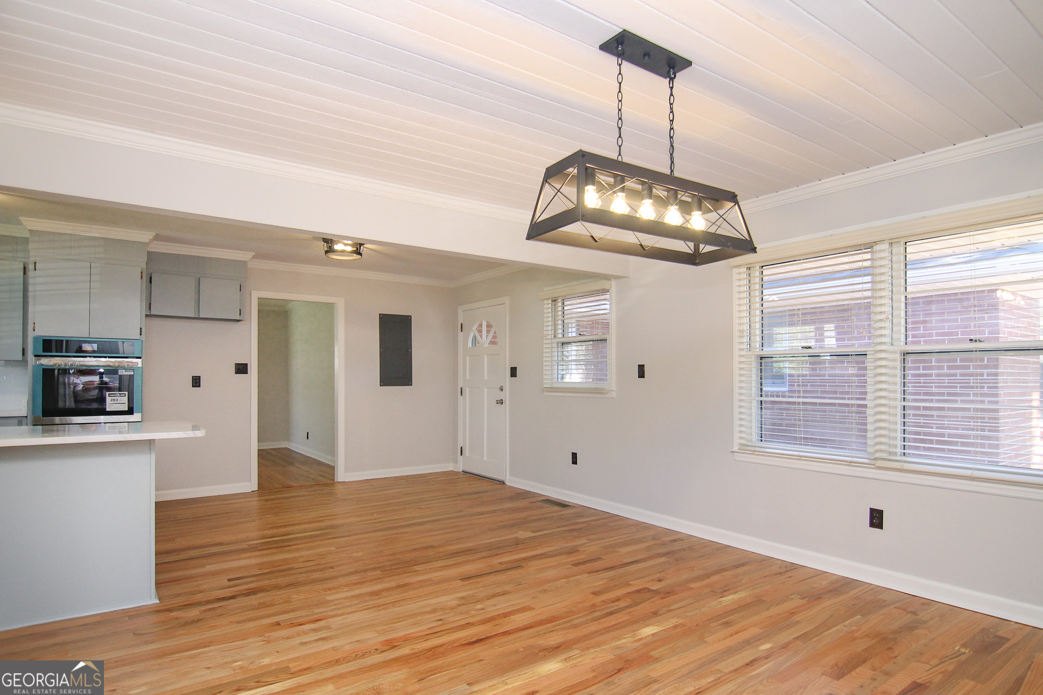 110 Springdale Drive Warner Robins, GA 31088 - Photo 10 of 25 a view of empty room with wooden floor and window