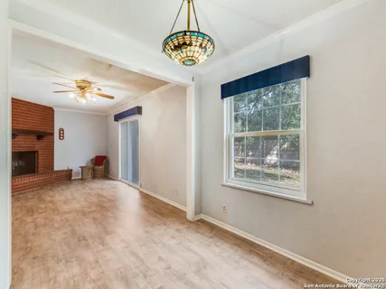 a view of livingroom with furniture and window