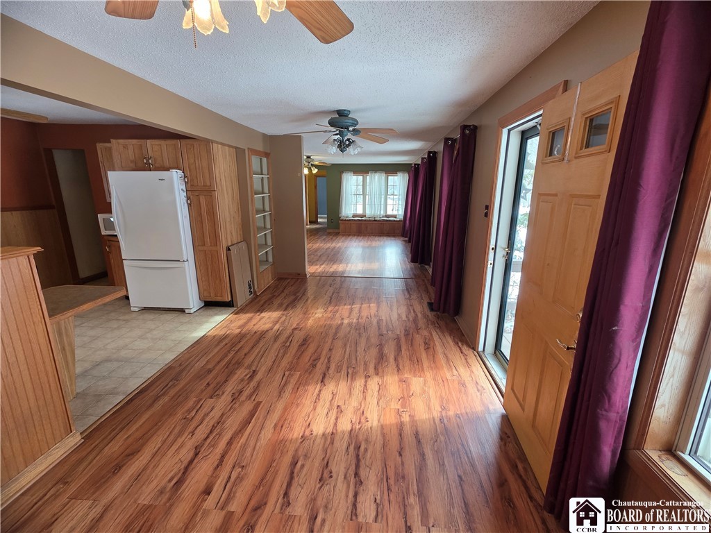6720 Moore Road Chautauqua, NY 14757 - Photo 16 of 50 Open-concept dining room to kitchen, looking ahead