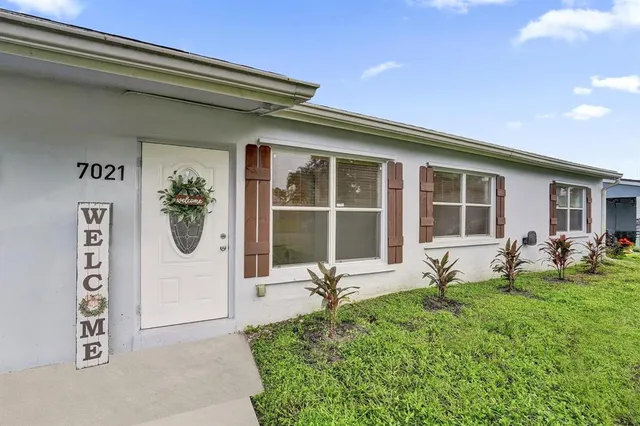 a front view of a house with patio