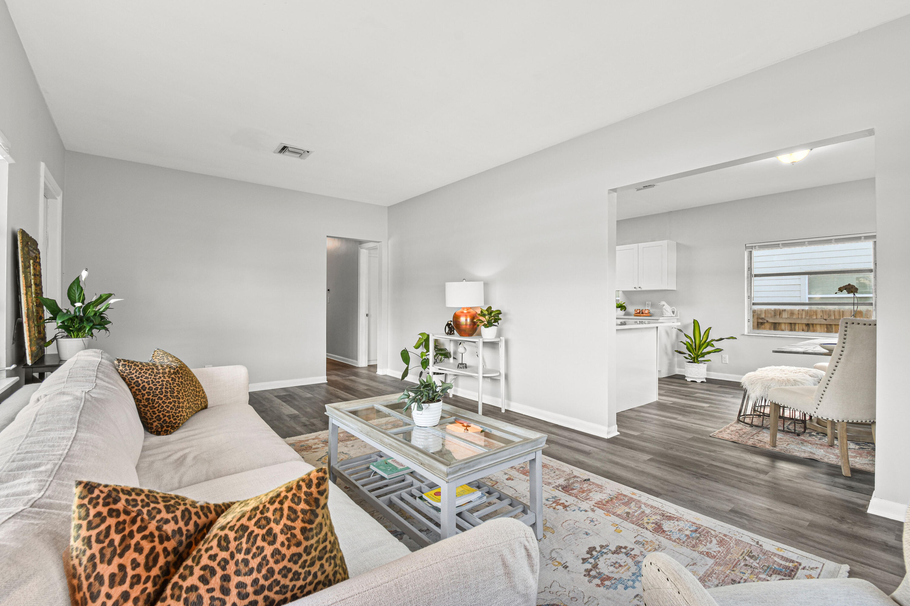 1102 Sunset Road West Palm Beach, FL 33401 - Photo 6 of 37 a living room with furniture and wooden floor