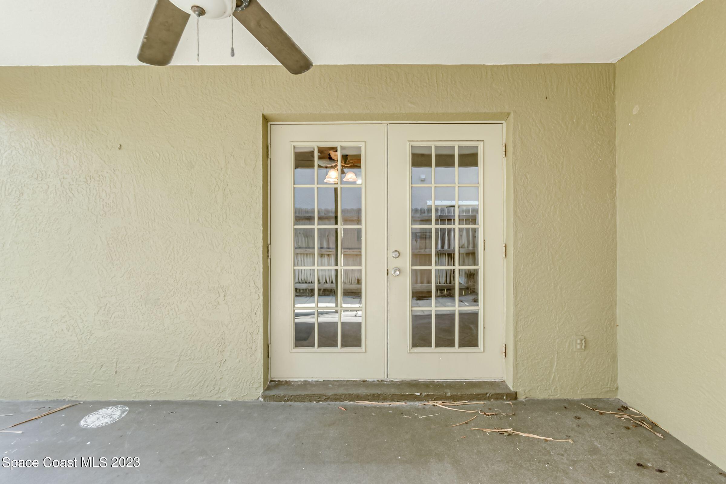 4540 Rivermist Drive Melbourne, FL 32935 - Photo 32 of 39 an empty room with windows