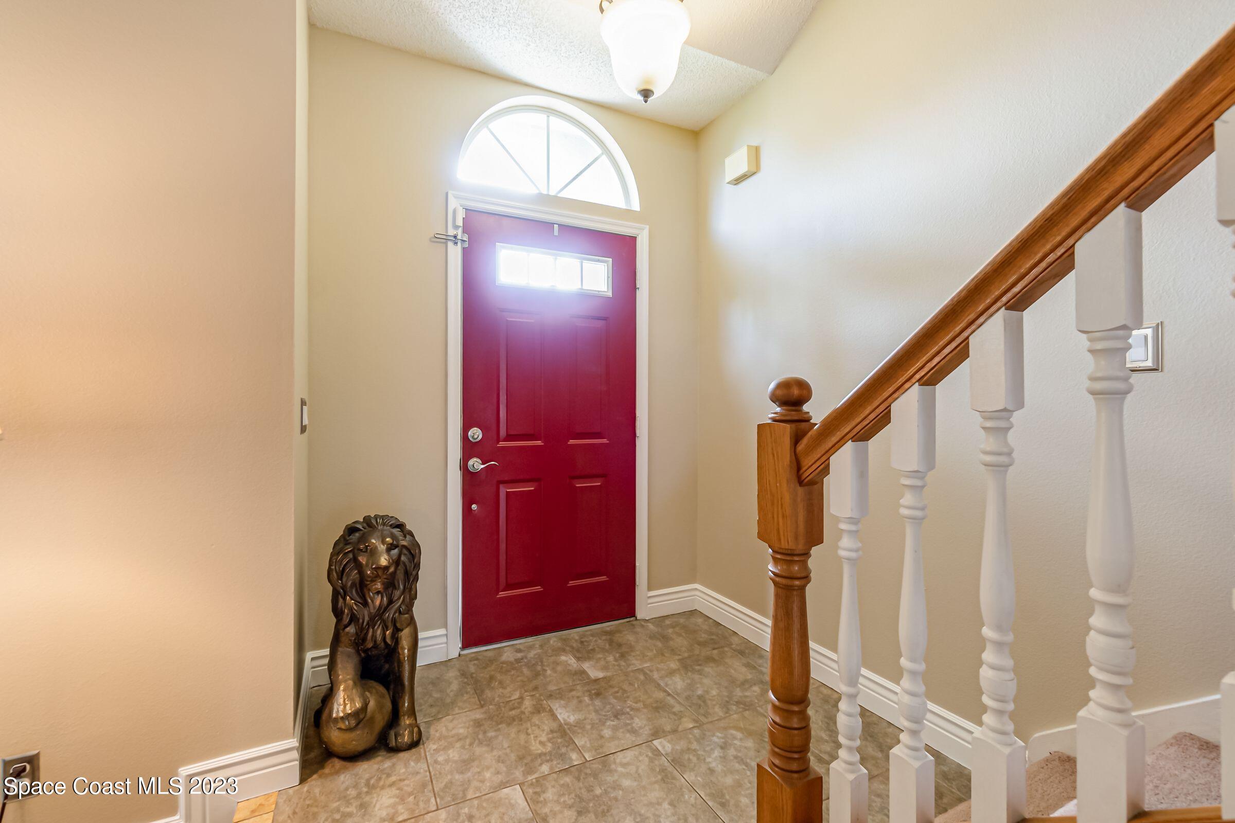 4540 Rivermist Drive Melbourne, FL 32935 - Photo 4 of 39 a view of front door with a door