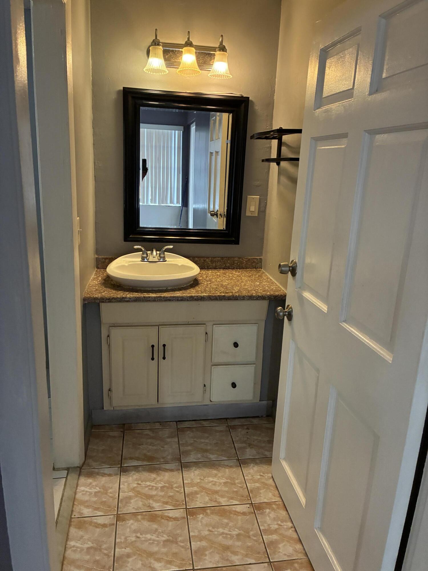 4943 Lincoln Road Delray Beach, FL 33445 - Photo 3 of 4 IMG_0711