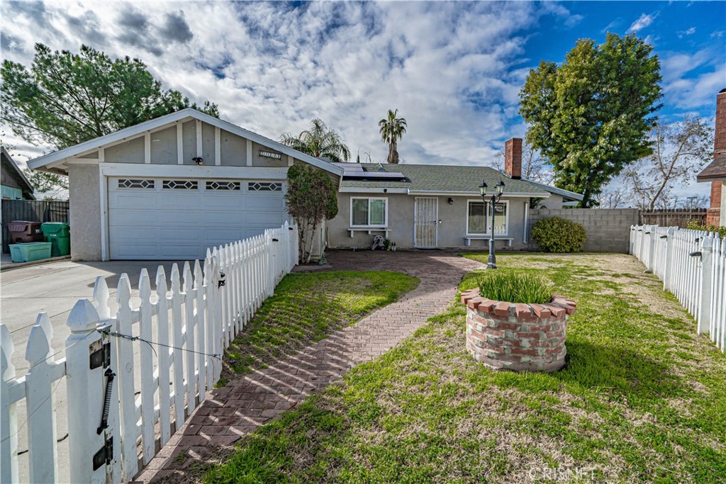 25141 Silent Creek Road Moreno Valley, CA 92553 - Photo 1 of 1 a front view of a house with garden