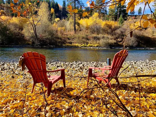 an outdoor view of with swimming pool and green space