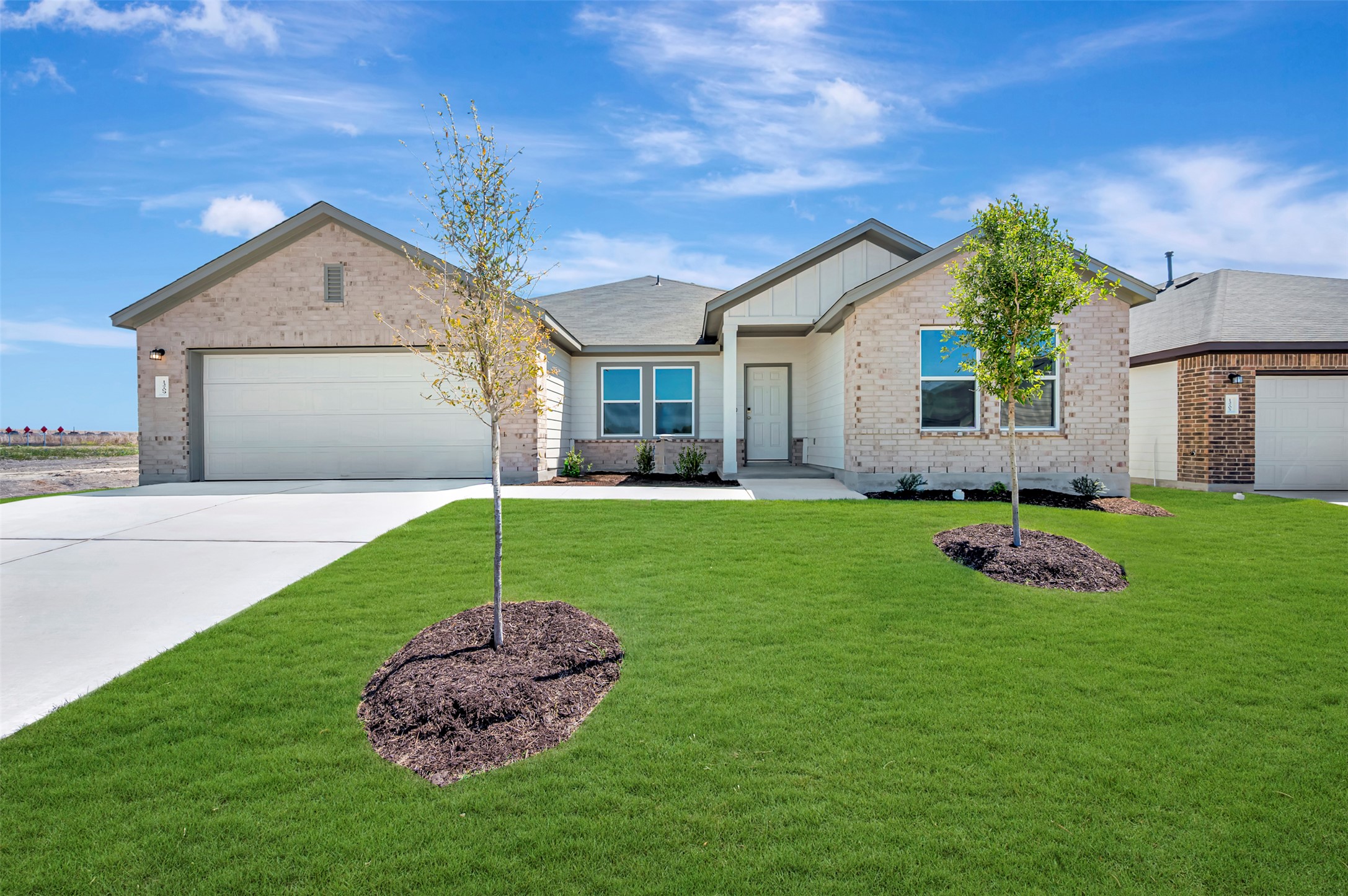 13709 Warnock Trail Manor, TX 78653 - Photo 1 of 40 a house view with a garden space