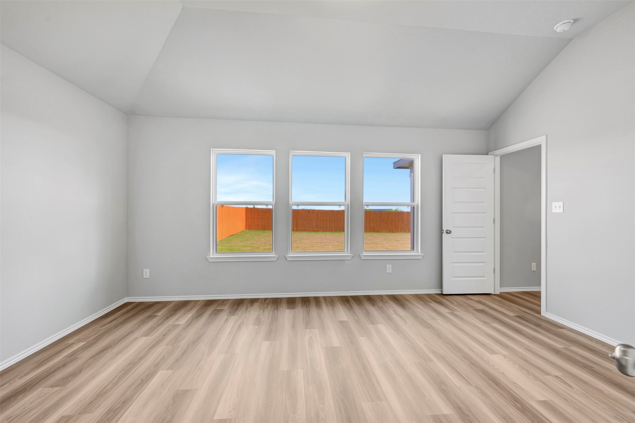 13709 Warnock Trail Manor, TX 78653 - Photo 11 of 40 wooden floor in an empty room