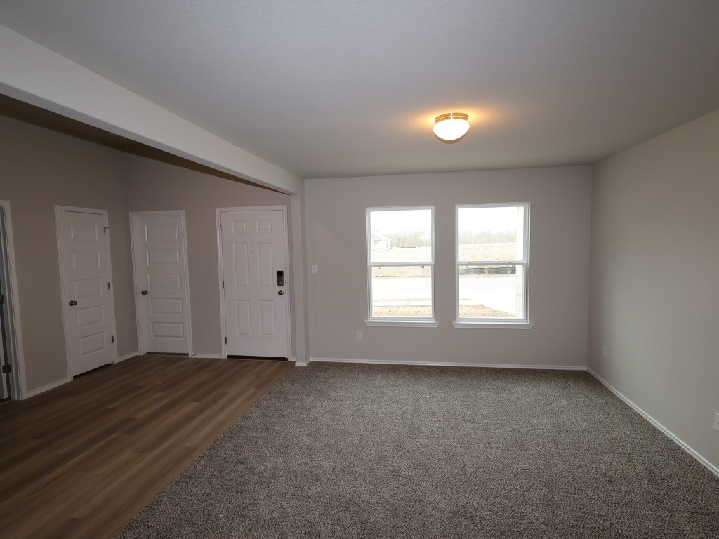 13709 Warnock Trail Manor, TX 78653 - Photo 12 of 25 a view of an empty room with a window