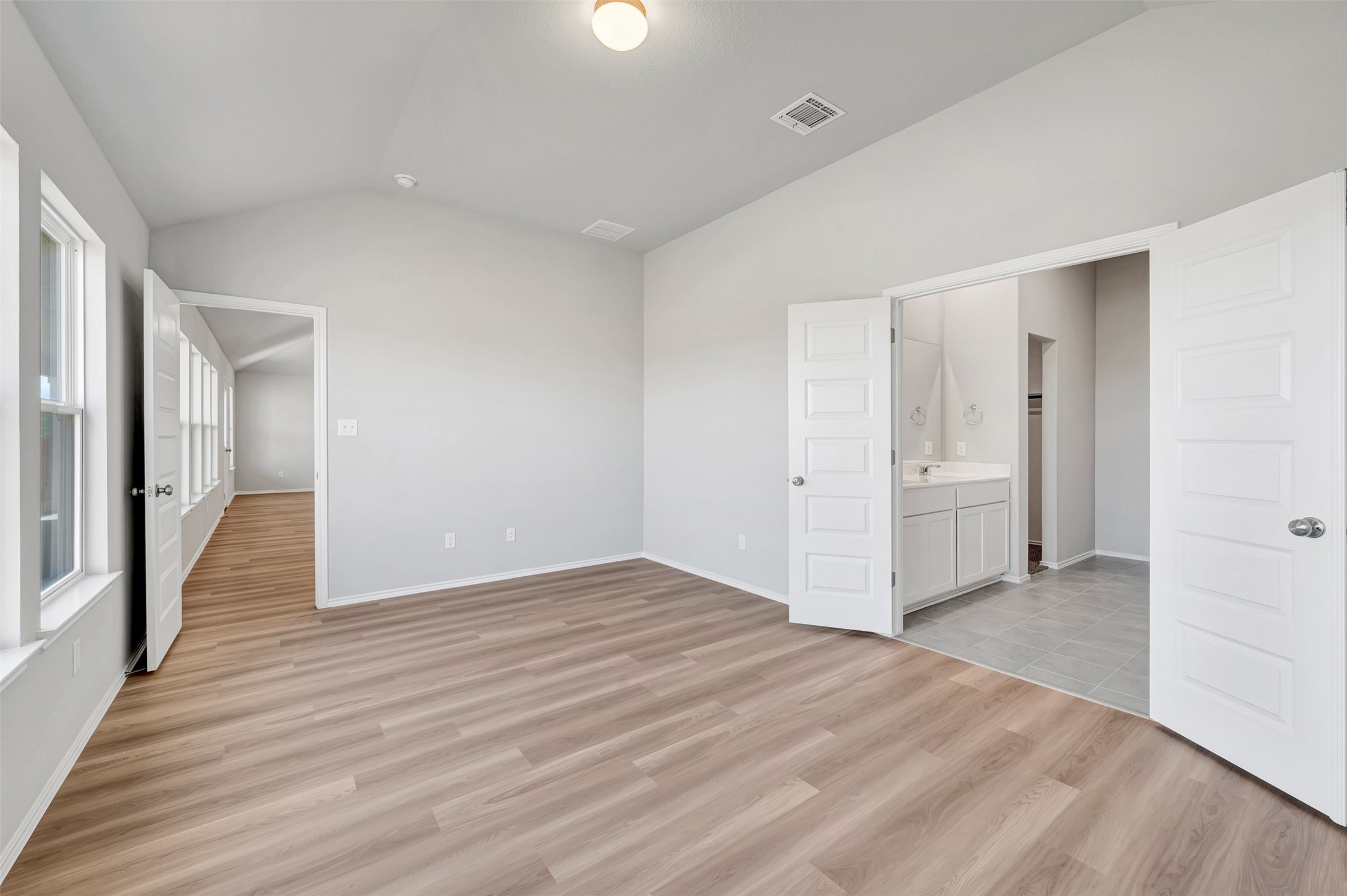 13709 Warnock Trail Manor, TX 78653 - Photo 12 of 40 a view of a hallway with wooden floor
