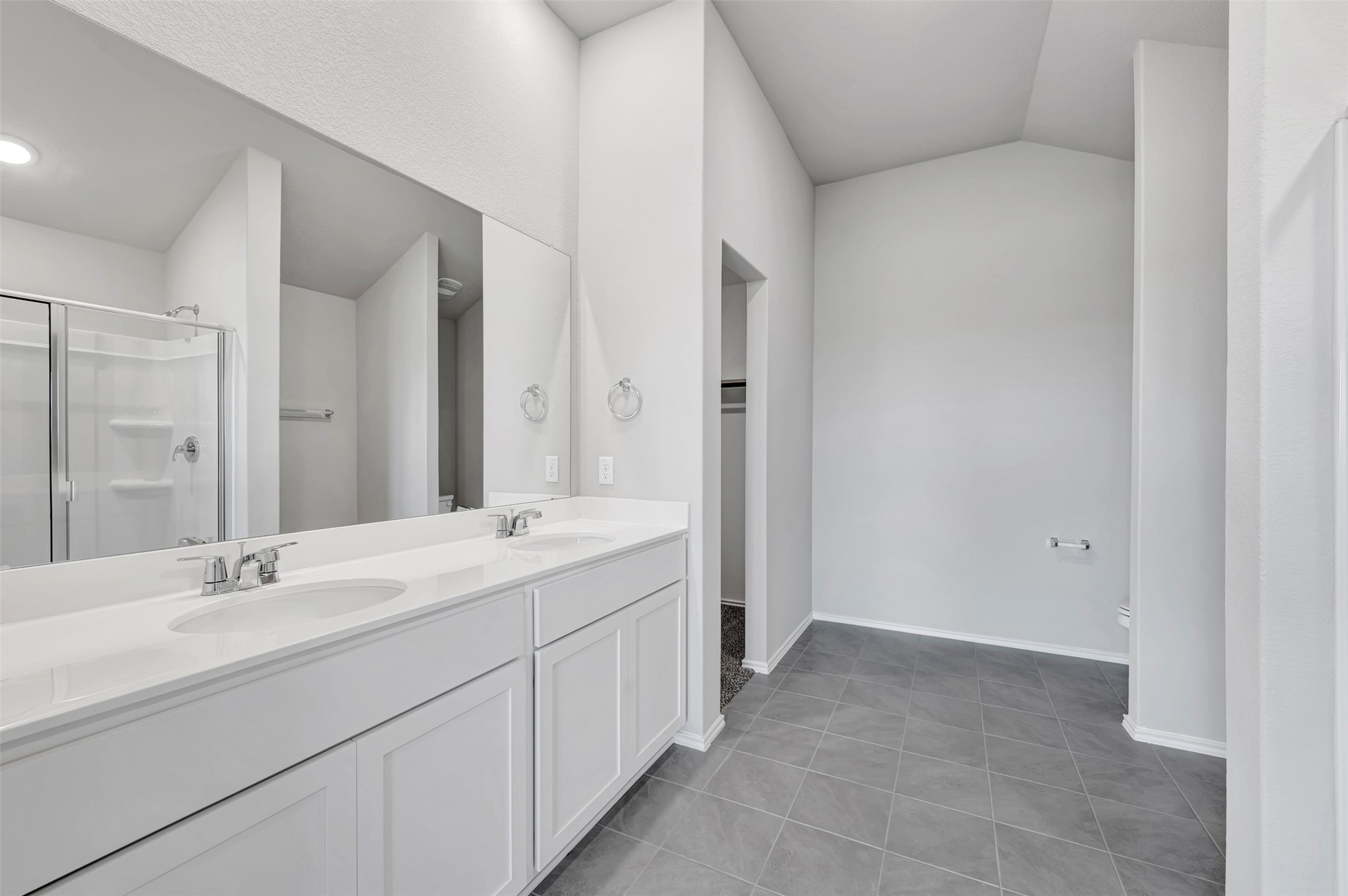 13709 Warnock Trail Manor, TX 78653 - Photo 15 of 40 a bathroom with a sink and a mirror