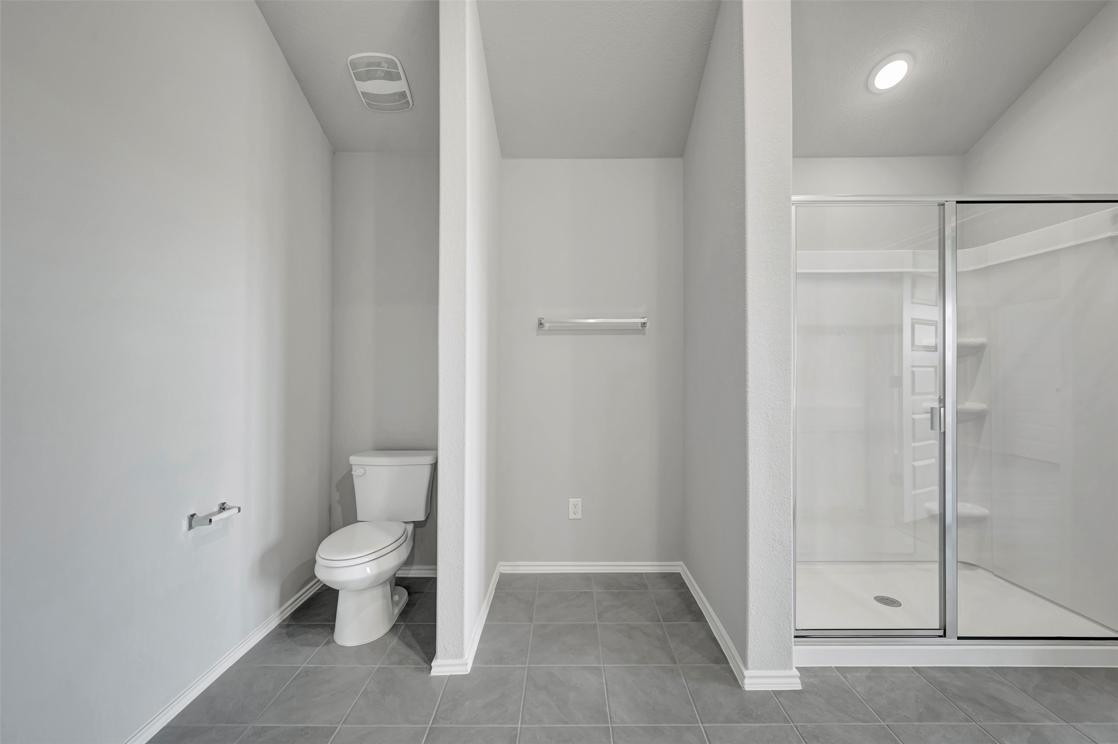 13709 Warnock Trail Manor, TX 78653 - Photo 20 of 40 a bathroom with a toilet