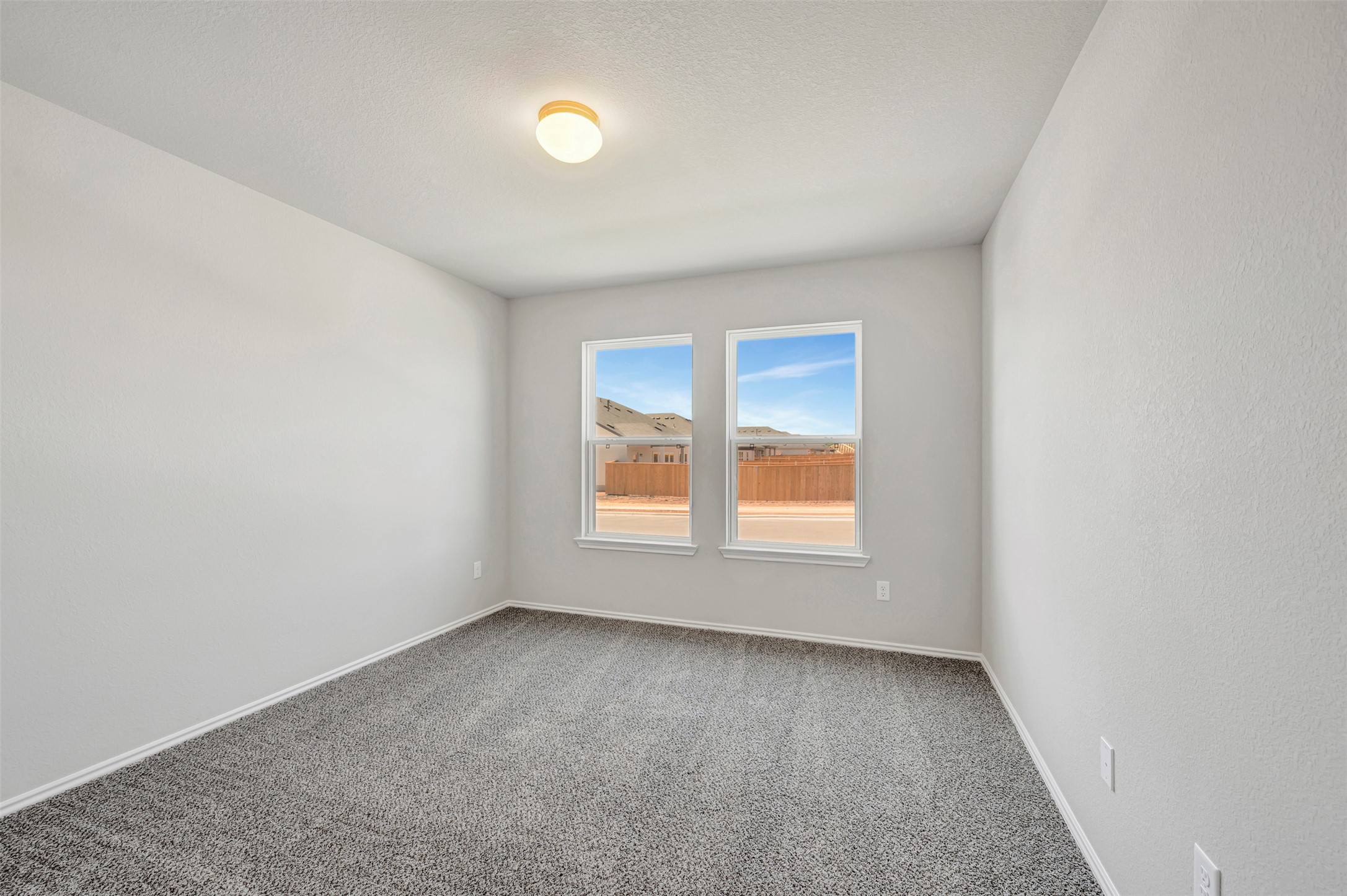 13709 Warnock Trail Manor, TX 78653 - Photo 22 of 40 an empty room with a window