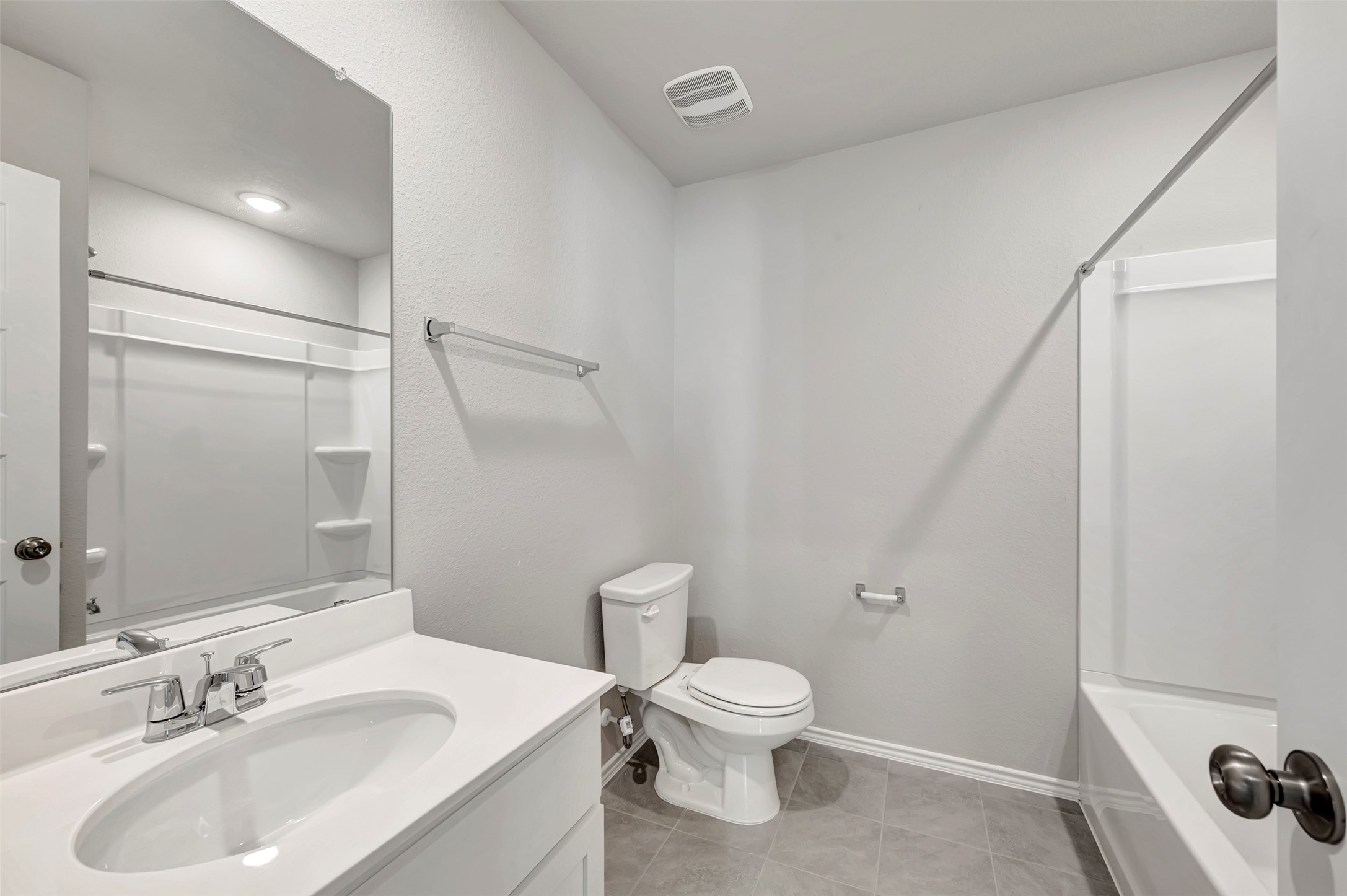 13709 Warnock Trail Manor, TX 78653 - Photo 24 of 40 a bathroom with a sink toilet and shower