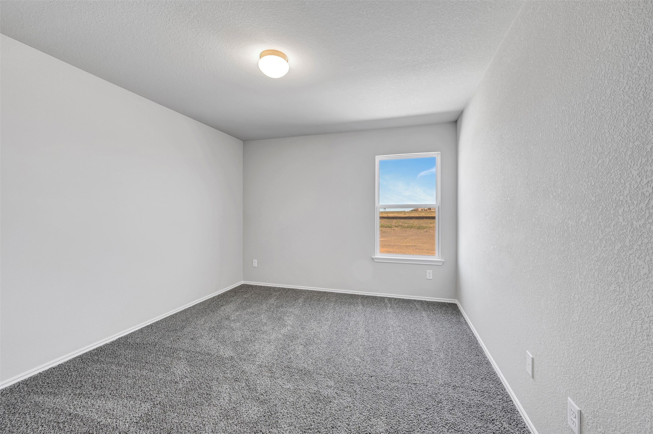 13709 Warnock Trail Manor, TX 78653 - Photo 29 of 40 an empty room with a window