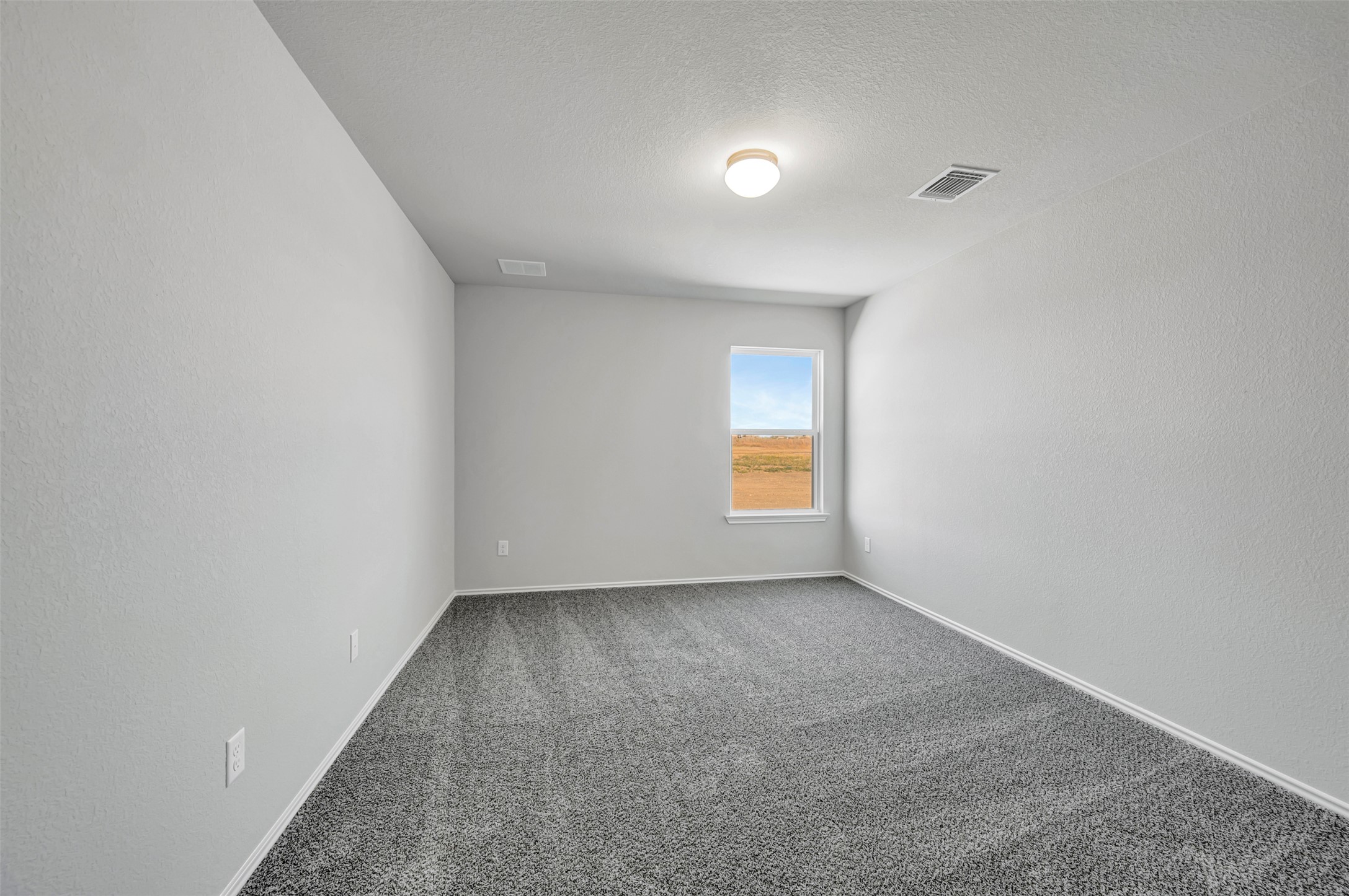 13709 Warnock Trail Manor, TX 78653 - Photo 33 of 40 an empty room with a window