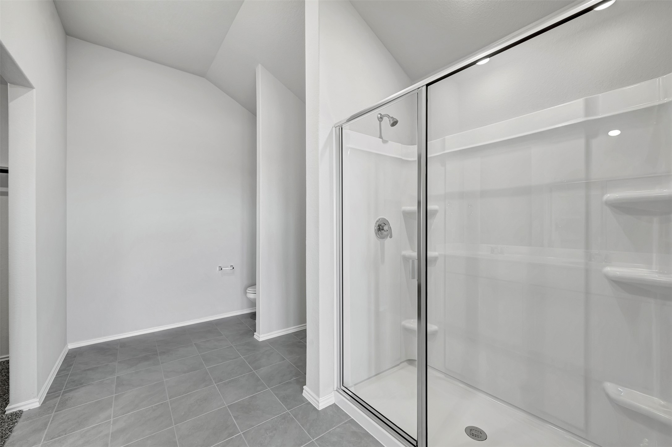 13709 Warnock Trail Manor, TX 78653 - Photo 40 of 40 a bathroom with a glass shower door