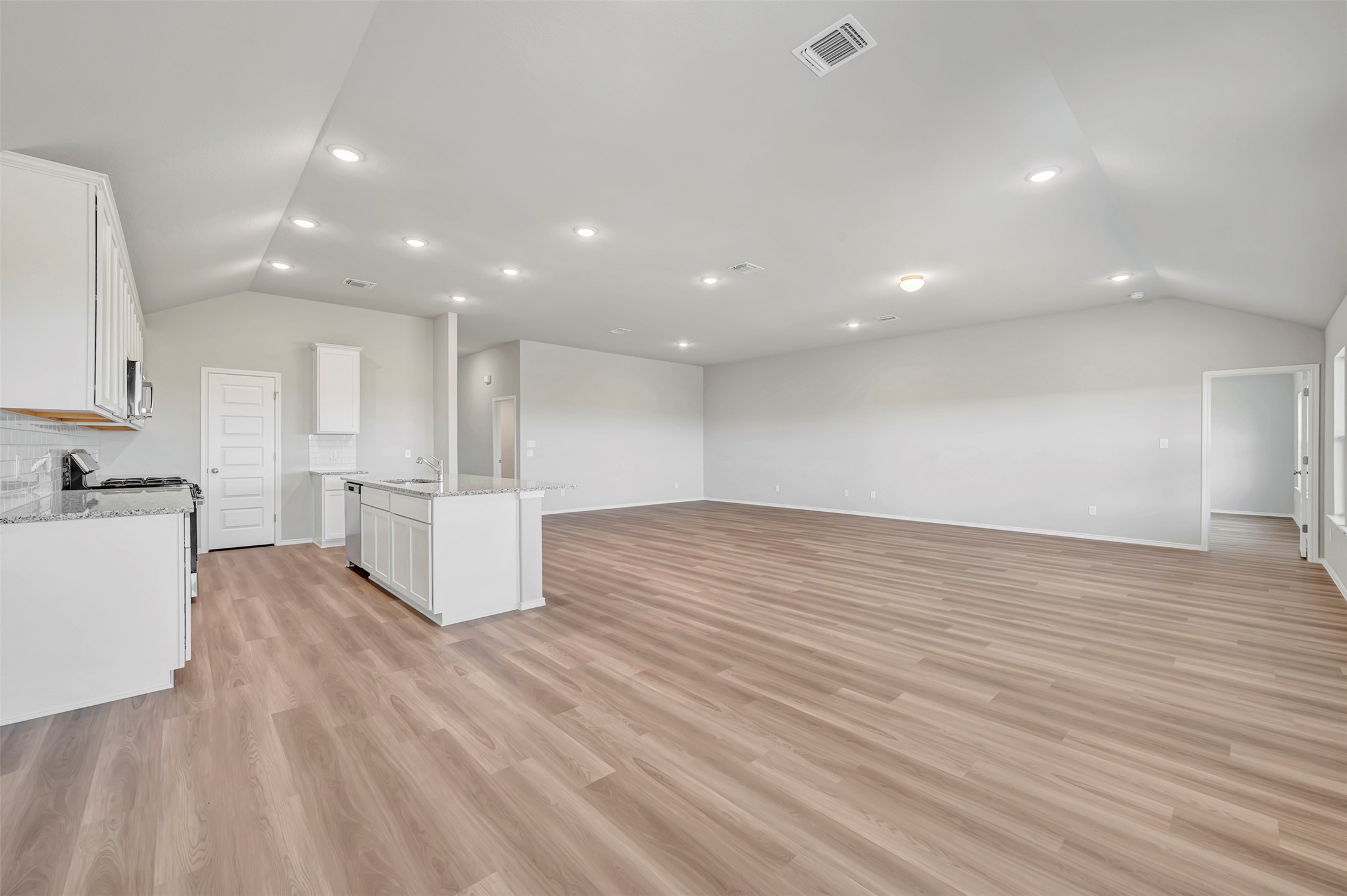 13709 Warnock Trail Manor, TX 78653 - Photo 6 of 40 a view of kitchen with wooden floor