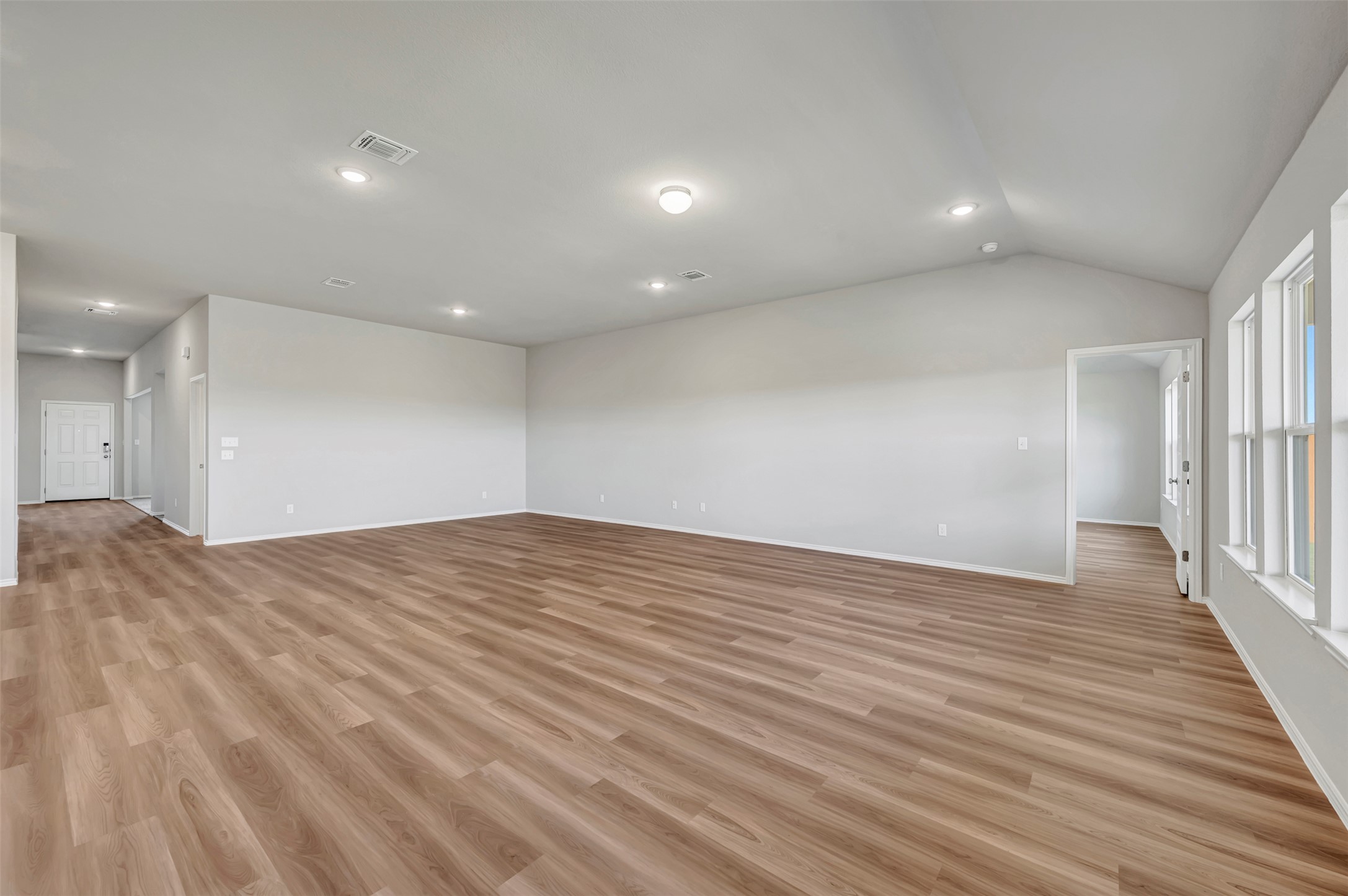 13709 Warnock Trail Manor, TX 78653 - Photo 10 of 40 a view of empty room with wooden floor