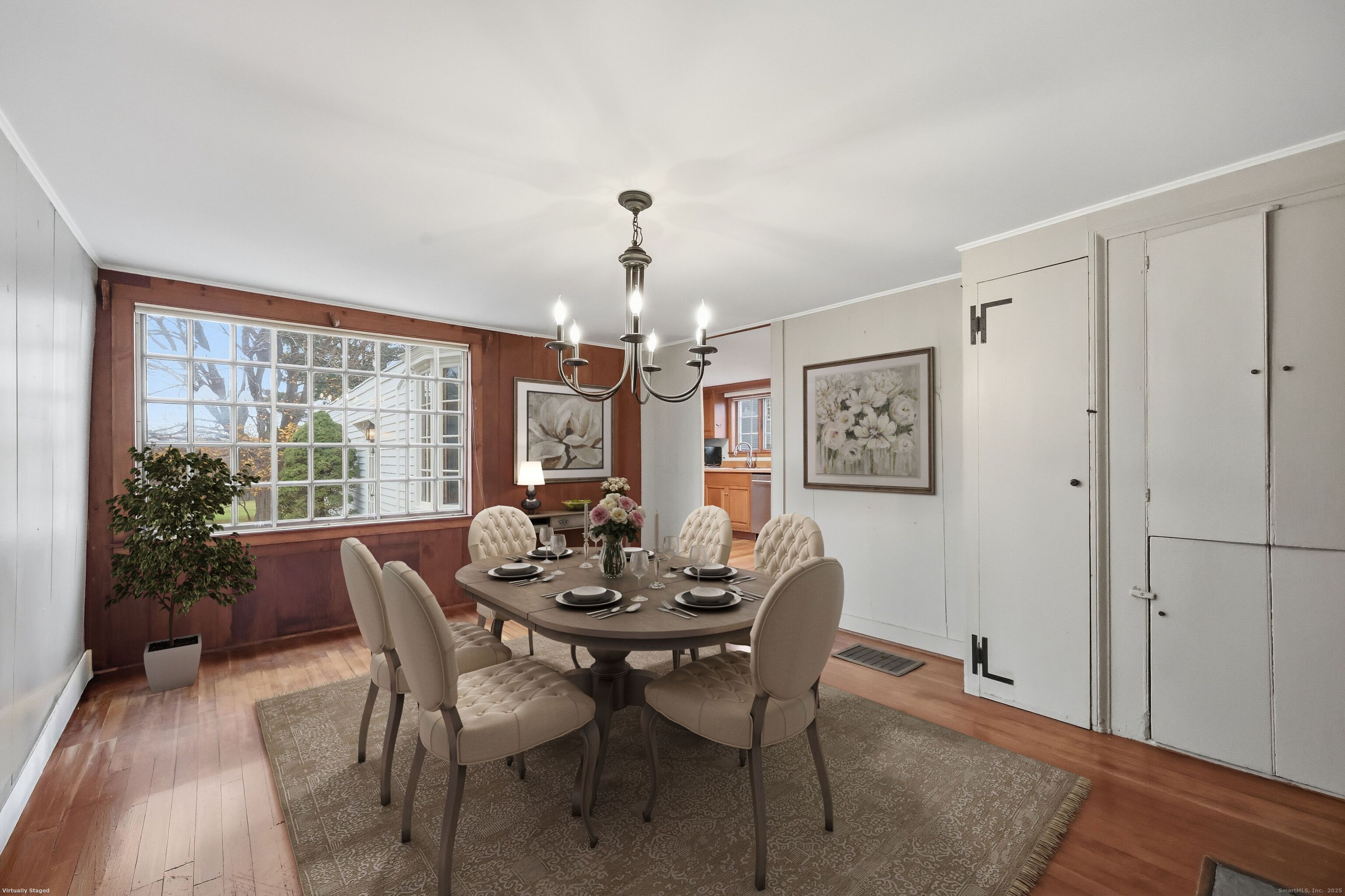 268 Main Street Durham, CT 06422 - Photo 13 of 40 Dining room with built-in cabinets and large picture window overlooking backyard.