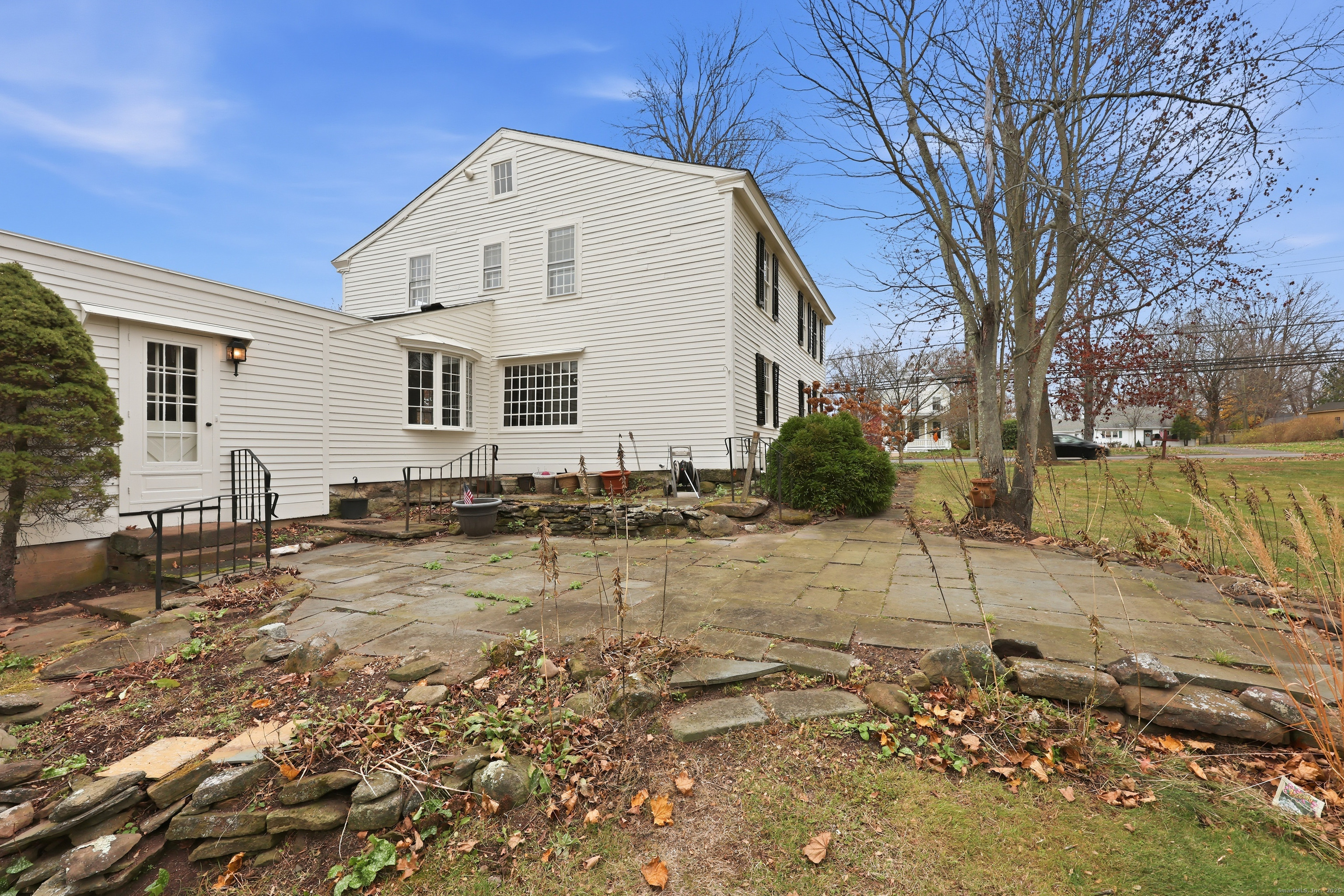 268 Main Street Durham, CT 06422 - Photo 19 of 40 a front view of a house with a yard