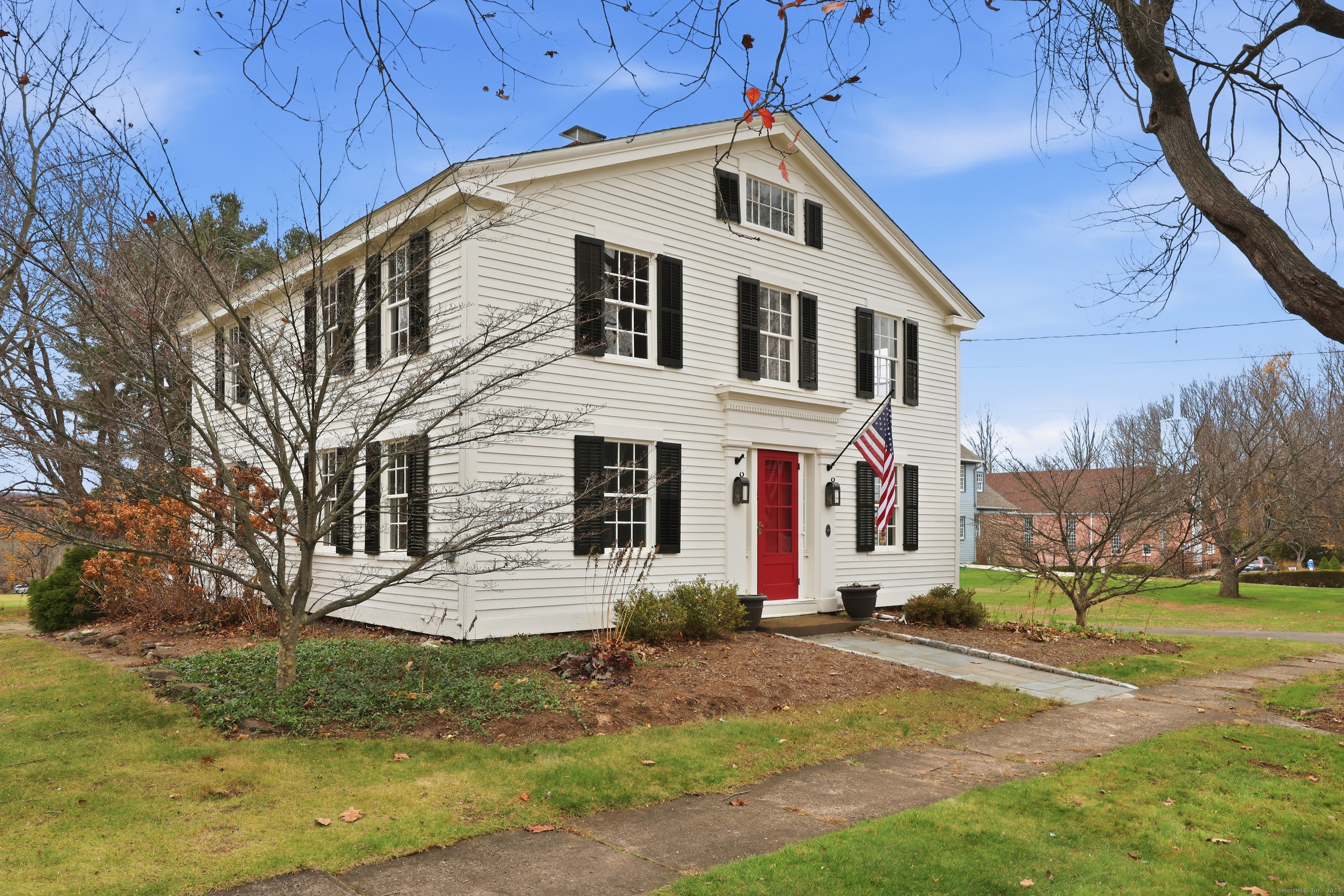 268 Main Street Durham, CT 06422 - Photo 2 of 40 a front view of a house with a yard