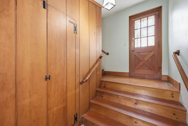a view of hallway with windows