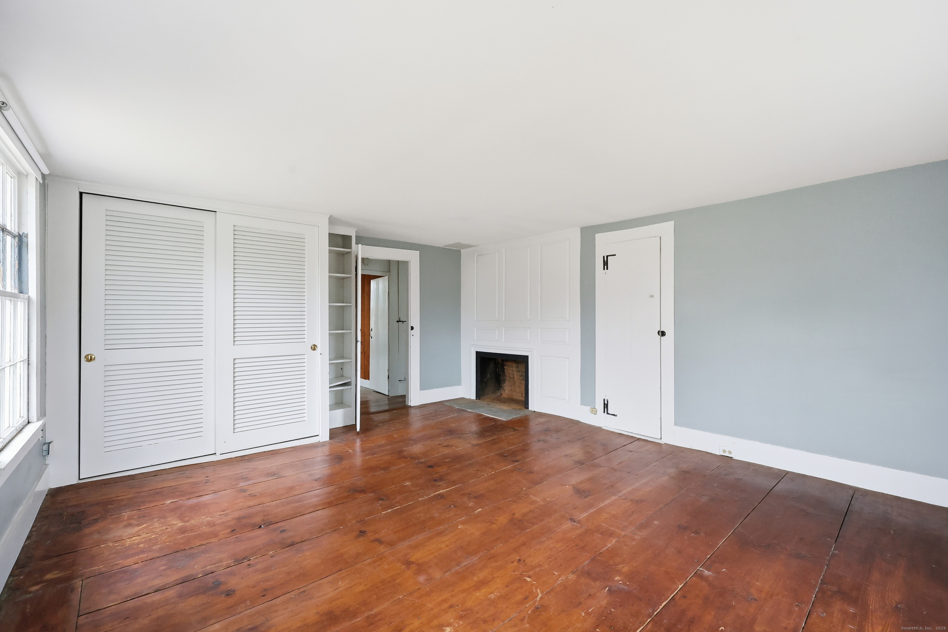 268 Main Street Durham, CT 06422 - Photo 27 of 40 Primary Bedroom with ample closet space and fireplace.