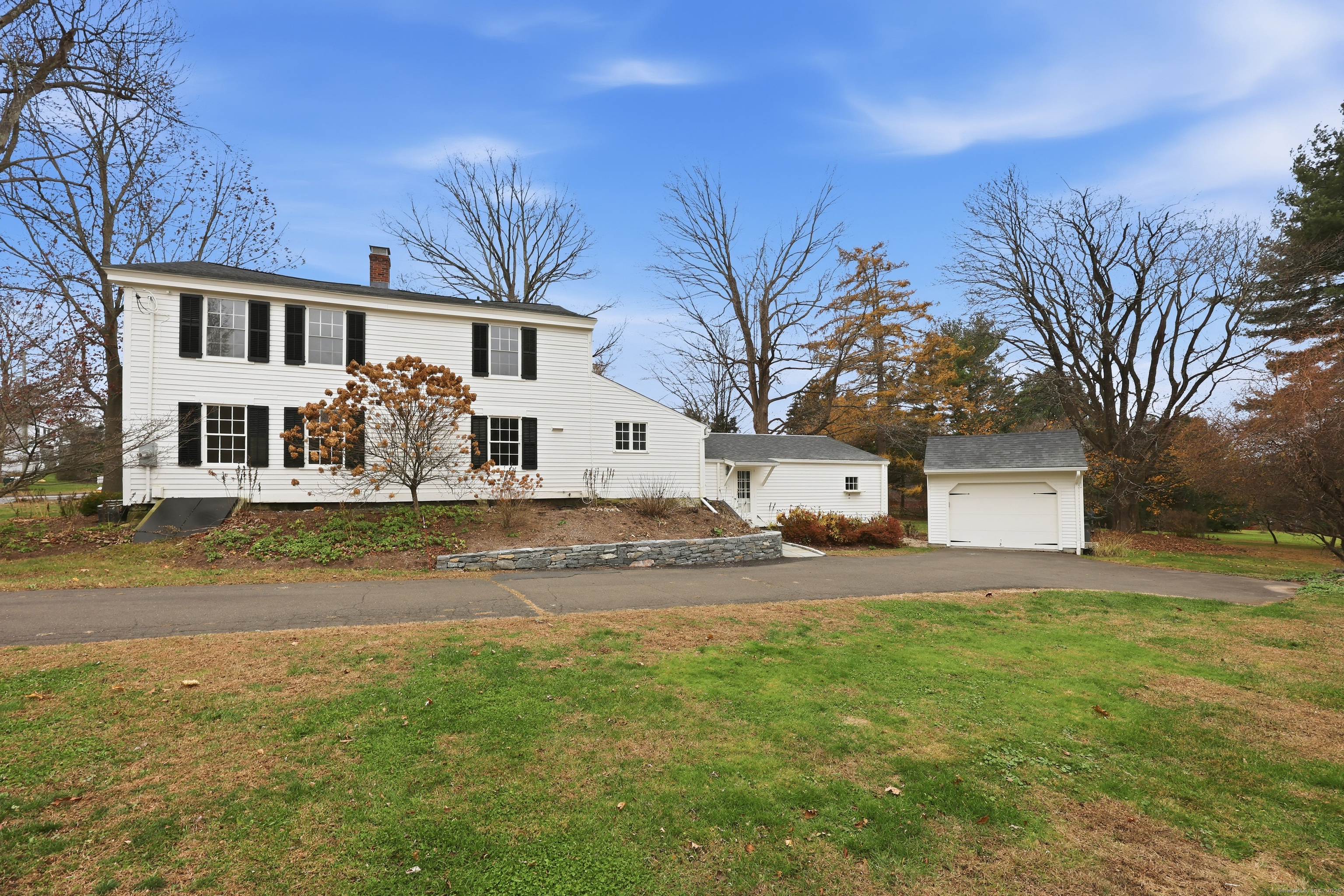 268 Main Street Durham, CT 06422 - Photo 31 of 40 a front view of a house with a yard