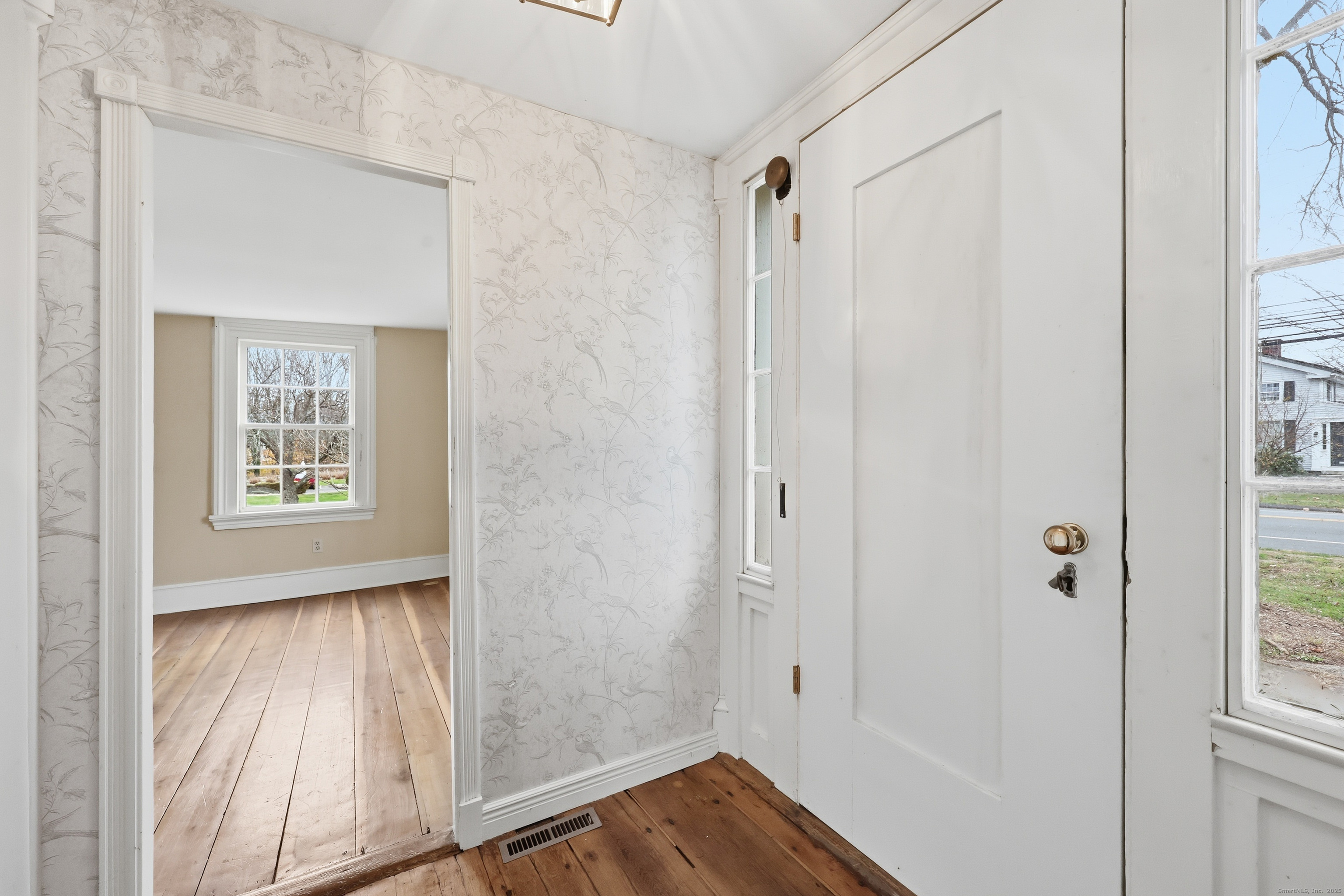 268 Main Street Durham, CT 06422 - Photo 33 of 40 a view of an empty room with wooden floor and a window