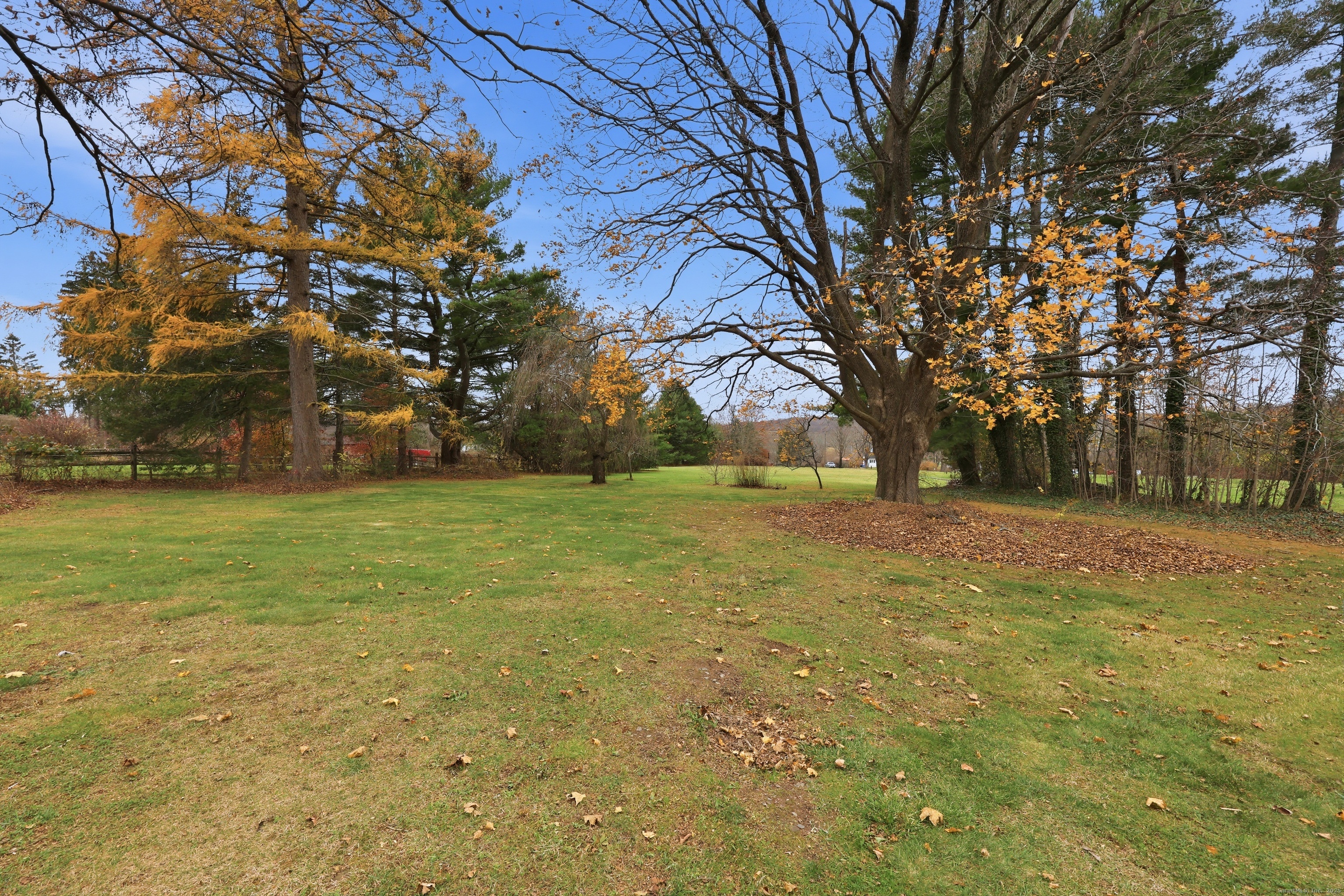268 Main Street Durham, CT 06422 - Photo 36 of 40 a view of outdoor space with trees all around