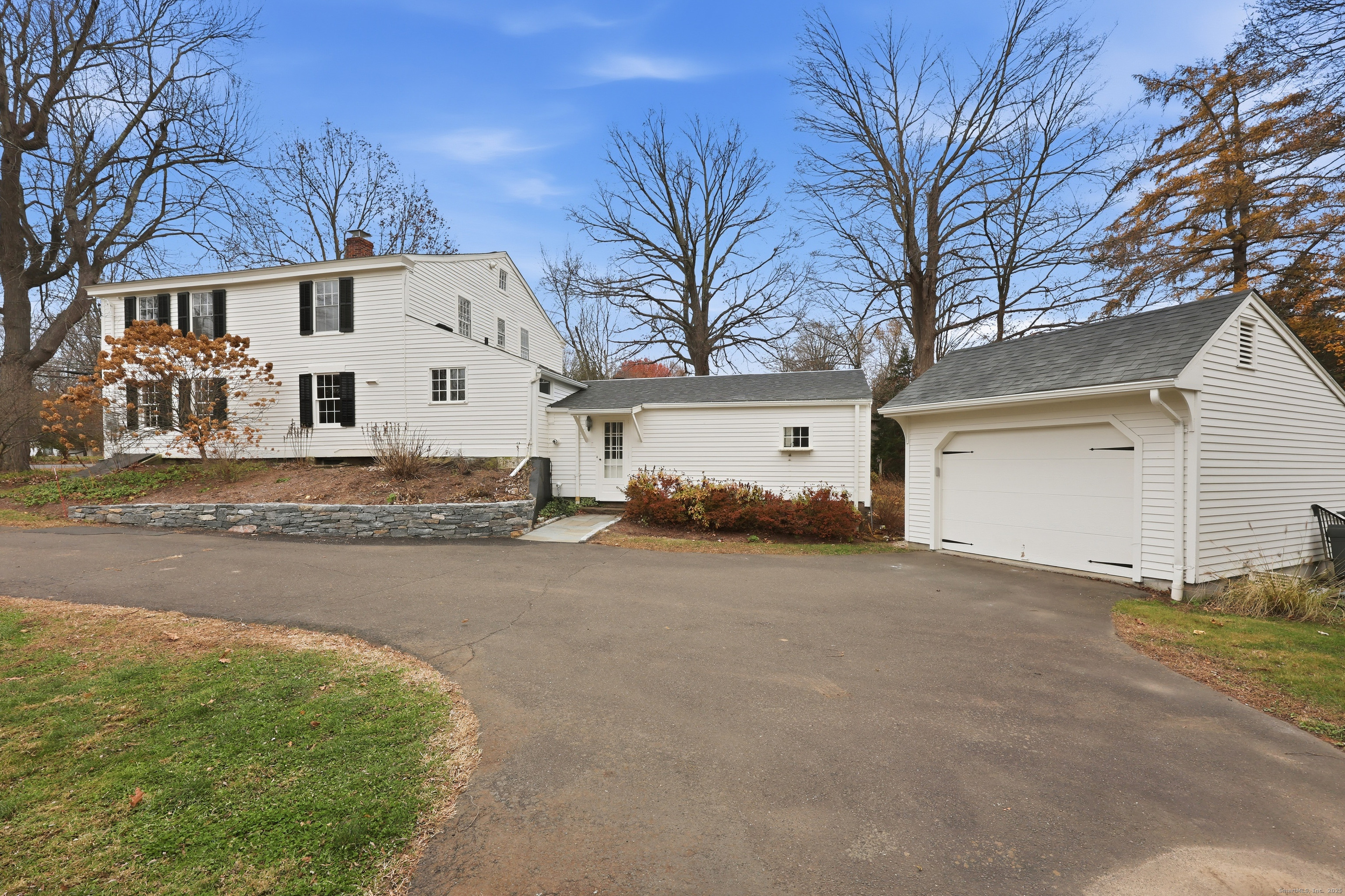 268 Main Street Durham, CT 06422 - Photo 5 of 40 Paved private driveway with detached 1-car garage.