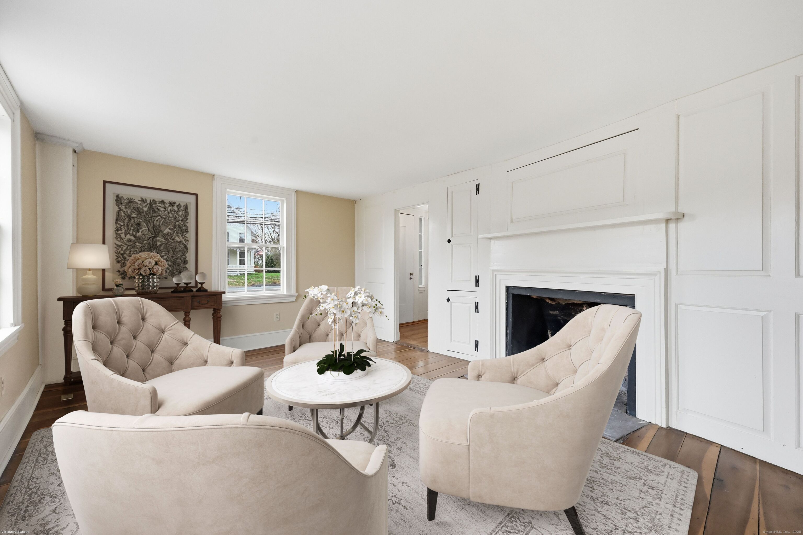 268 Main Street Durham, CT 06422 - Photo 8 of 40 Front facing salon with fireplace & original moulding detail.
