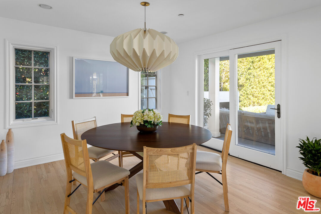 369 22nd Street Santa Monica, CA 90402 - Photo 12 of 29 a view of a dining room with furniture window and wooden floor
