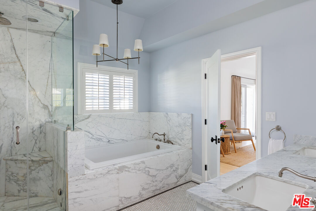 369 22nd Street Santa Monica, CA 90402 - Photo 19 of 29 a bathroom with a tub sink and mirror