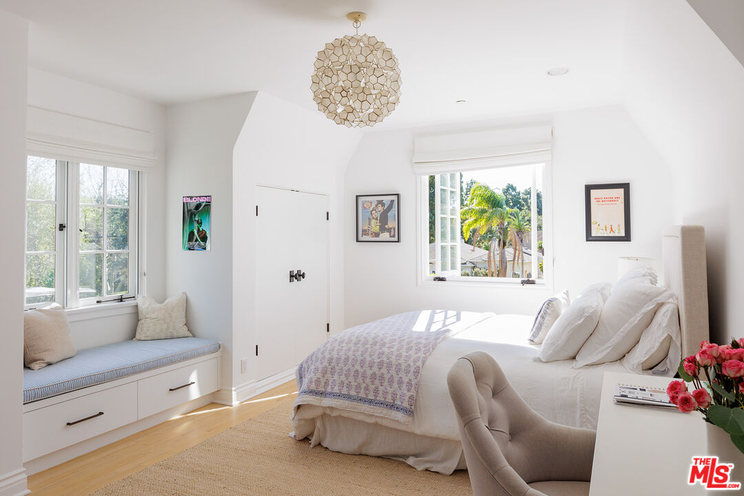 369 22nd Street Santa Monica, CA 90402 - Photo 21 of 29 a bedroom with a bed and a couch