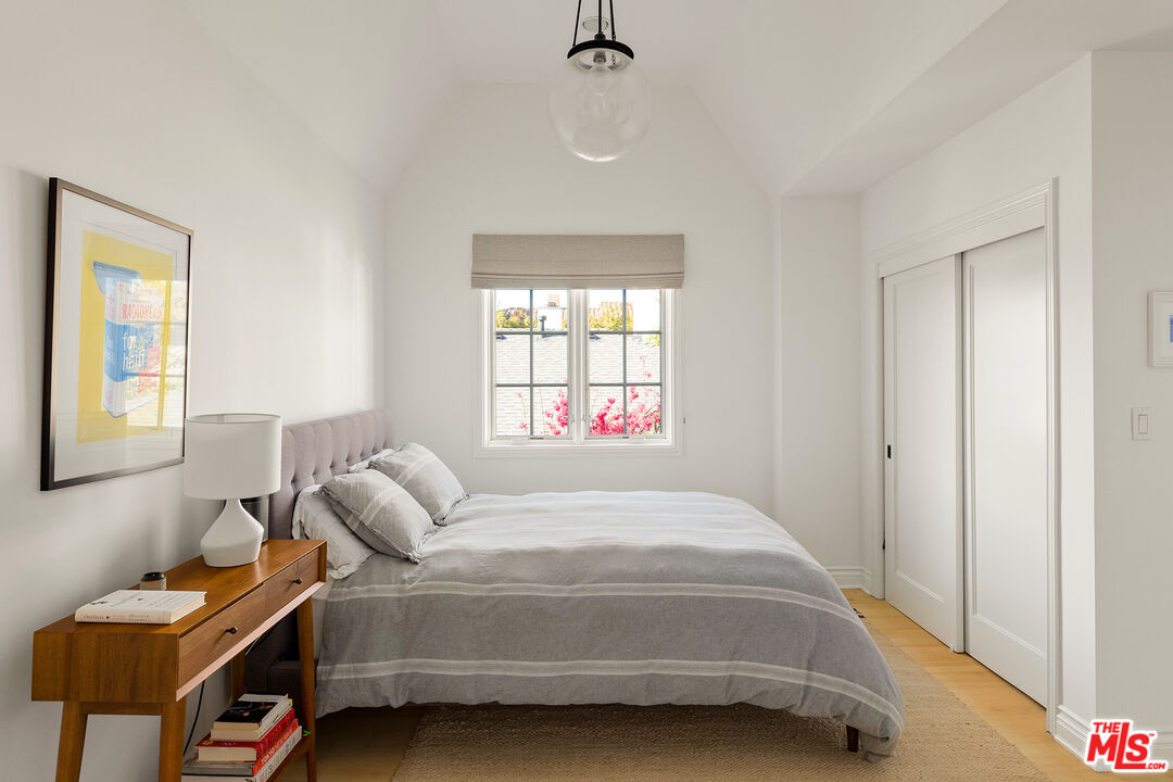 369 22nd Street Santa Monica, CA 90402 - Photo 23 of 29 a bedroom with a bed and a window