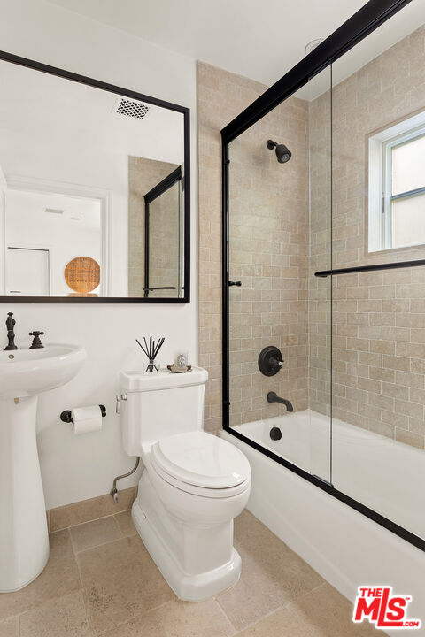 369 22nd Street Santa Monica, CA 90402 - Photo 27 of 29 a bathroom with a sink toilet and shower