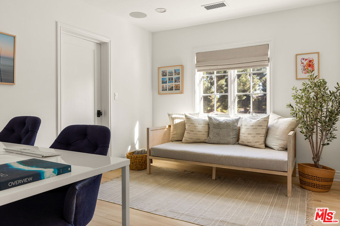 369 22nd Street Santa Monica, CA 90402 - Photo 28 of 29 a living room with furniture and a window